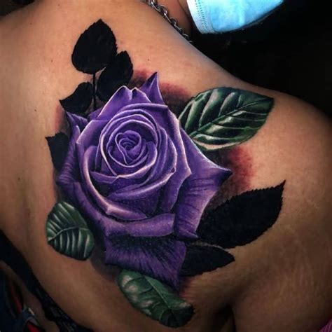 blue rose tattoo on dark skin|blue and purple rose tattoo.